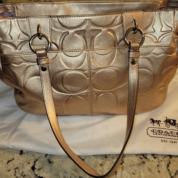 Coach gold purse good condition about 13 inches long and 7 inches tall - Picture 1 of 9